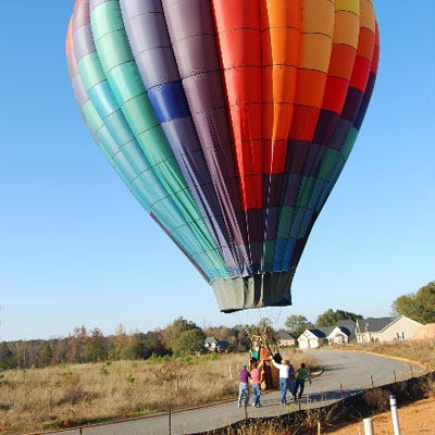 A balloon with people on the road